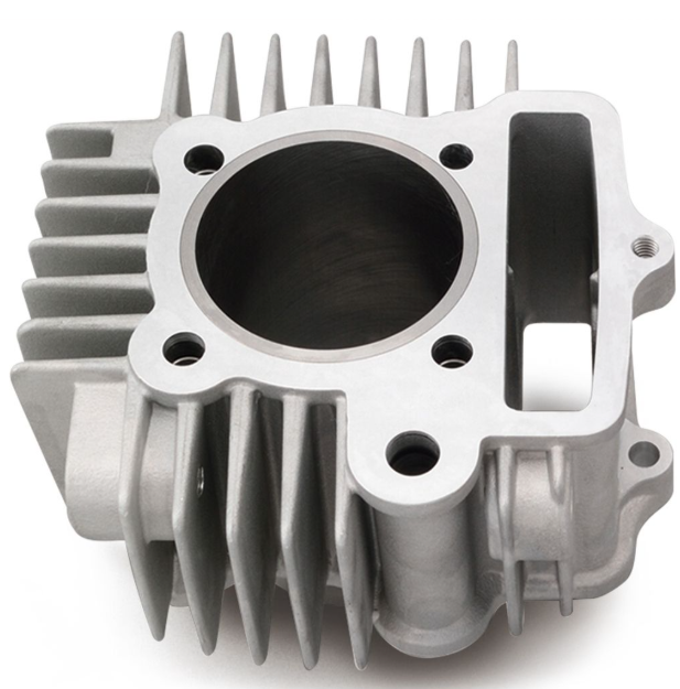 Metallic engine cylinder head on a white background