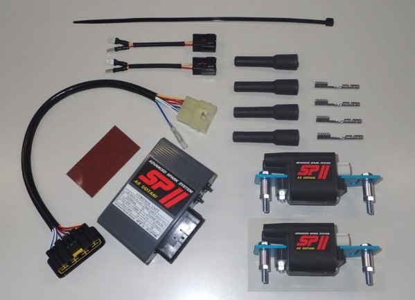 Collection of electronic components and wiring on a white background
