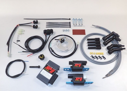 Automotive ignition system components on a white background