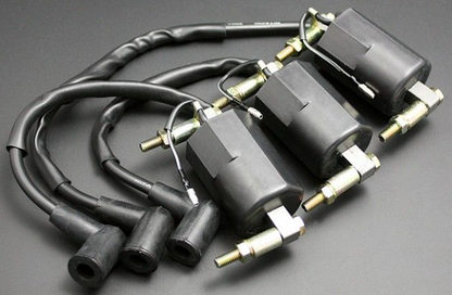 Set of ignition cables on a gray background