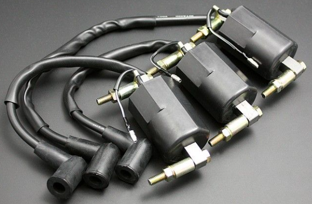 Set of ignition cables on a gray background