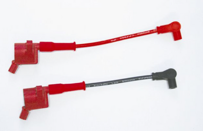 Two red ignition cables on a white background