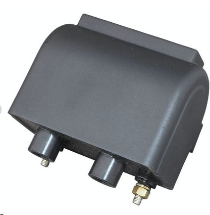 Gray mechanical component with multiple ports on a white background
