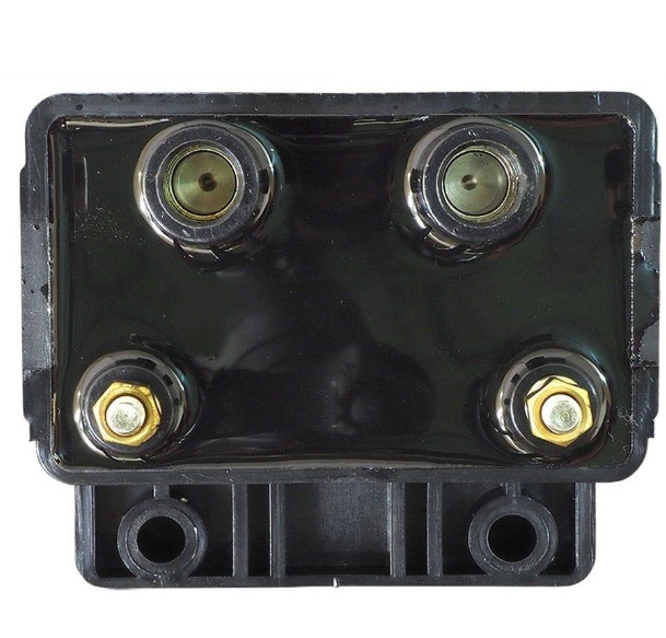Black electrical connector with four metallic terminals on a white background