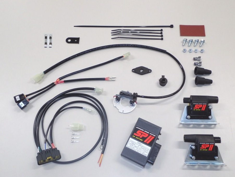 Automotive wiring harness and components on a white background