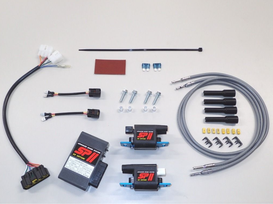 Automotive wiring harness kit with connectors and components on a white background