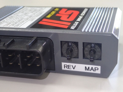 Car tuning device with 'REV' and 'MAP' labels on a white background