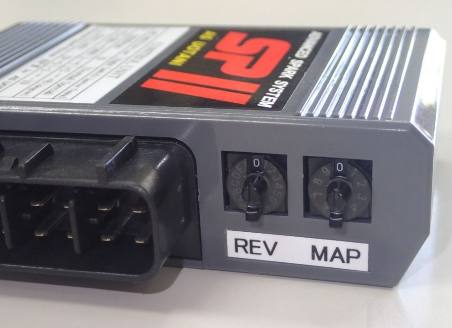 Car tuning module with 'SP II' branding on a white background