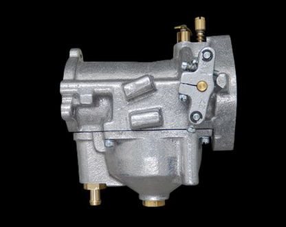 Mechanical component with brass fittings on a black background