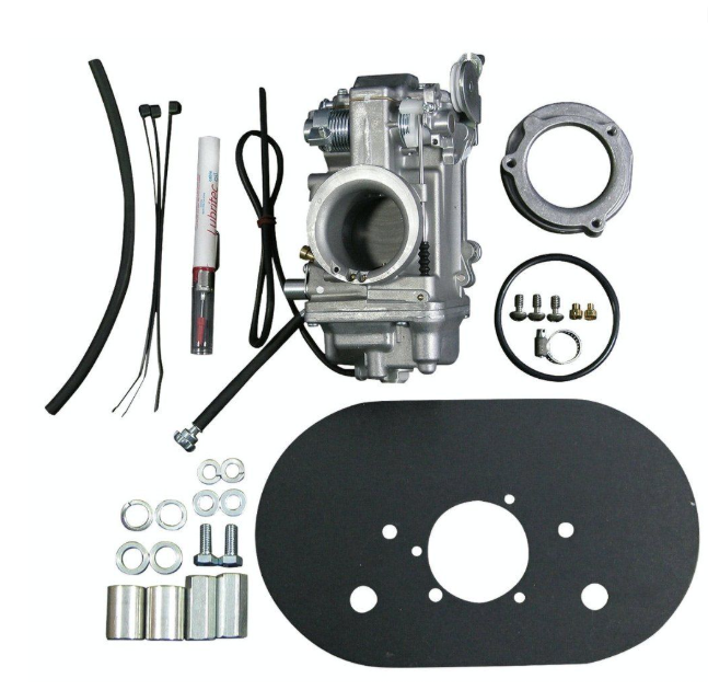 Carburetor kit with various parts on a white background