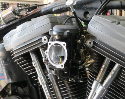 Close-up of a motorcycle engine with visible mechanical components.