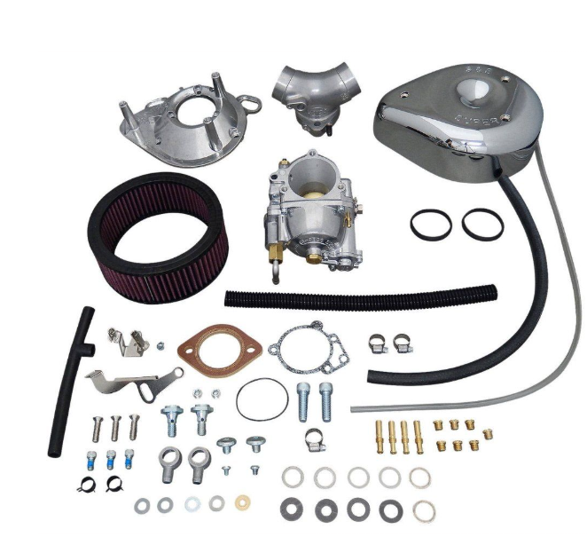 Carburetor kit with various parts on a white background