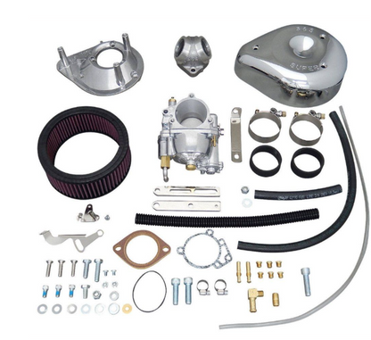 Carburetor kit with various components on a white background