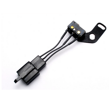 Black electronic component with wiring on a white background