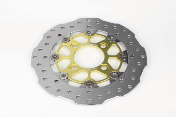 Motorcycle disc brake rotor with gold center on a white background