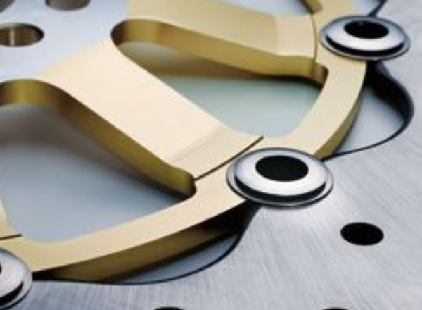 Close-up of a gold and silver metal gear mechanism