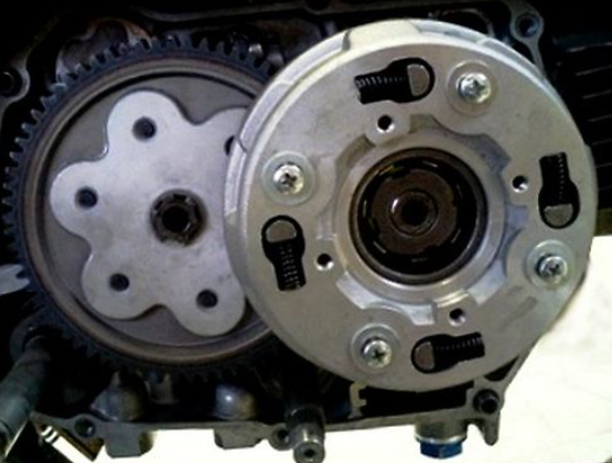 Close-up of mechanical components, likely part of an engine or machinery.