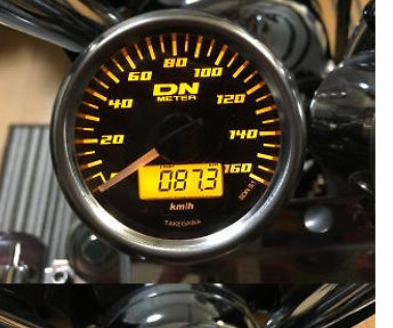 Motorcycle speedometer with digital display and needle indicator