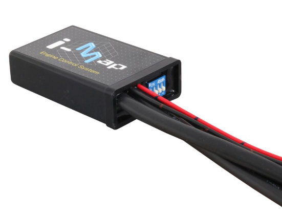 Black electronic module with wires on a white background