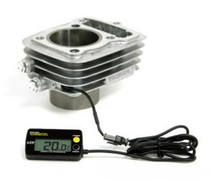 Engine cylinder with digital thermometer on a white background